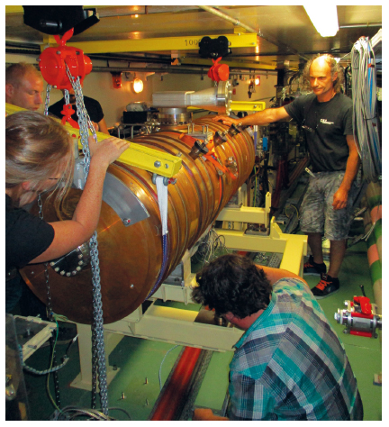 installation of two five-cell cavities in the booster